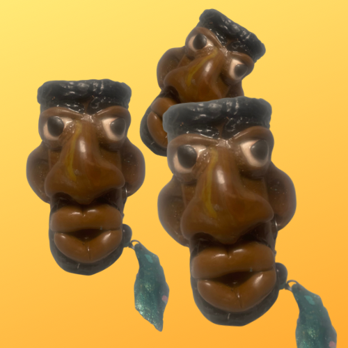 Caricature lighter holder.